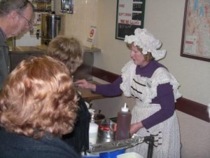 The Pancake maiden works feverishly to keep up