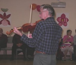 Laurie fiddles away!