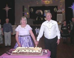 President Eddie & Rosalie cutting the cake